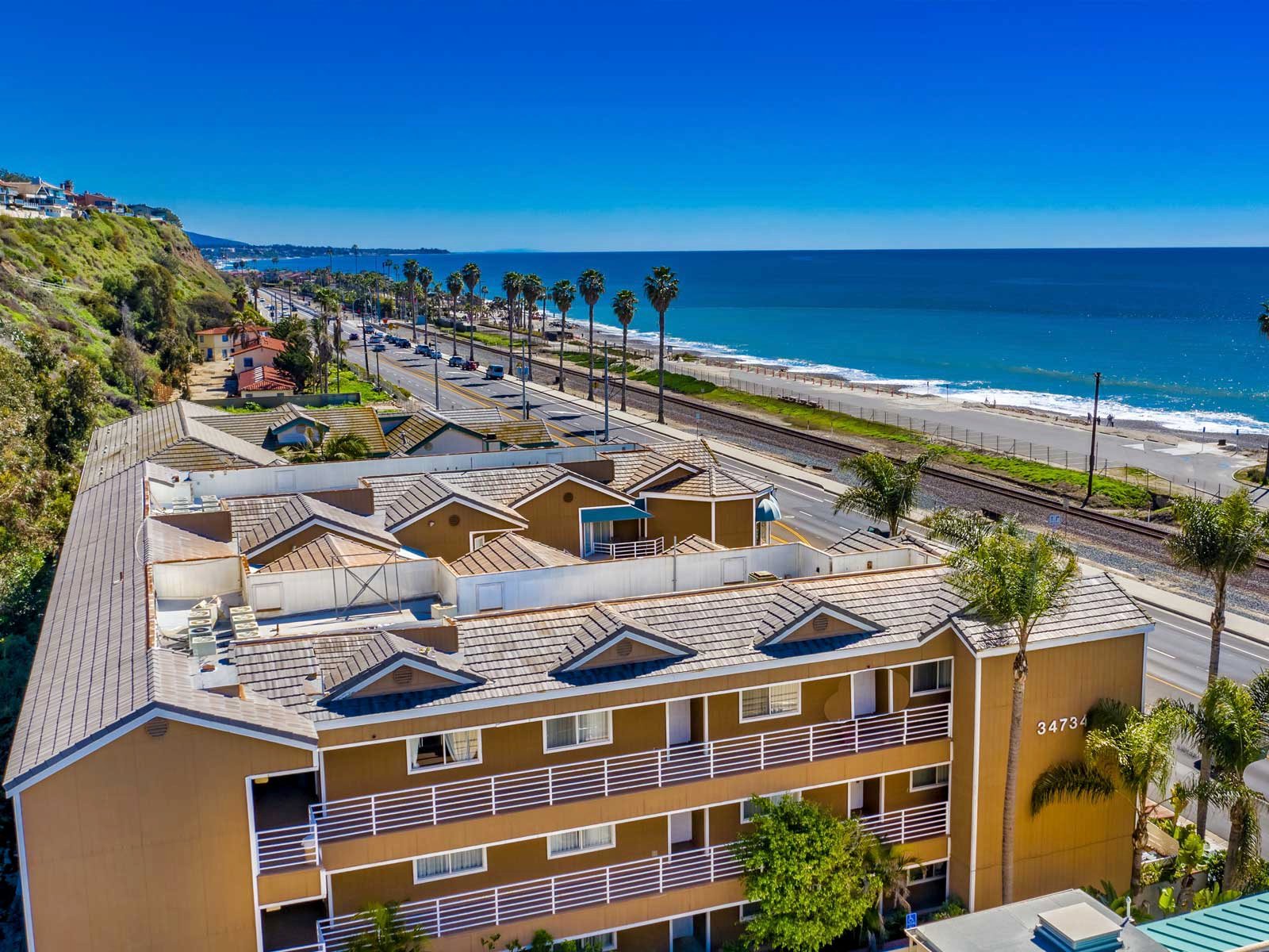 Beachfront Inn - View from behind with the ocean in the background